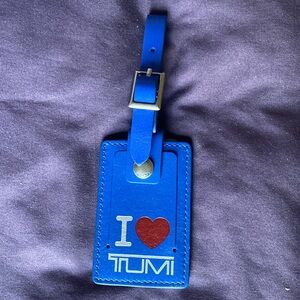 Tumi luggage tag.